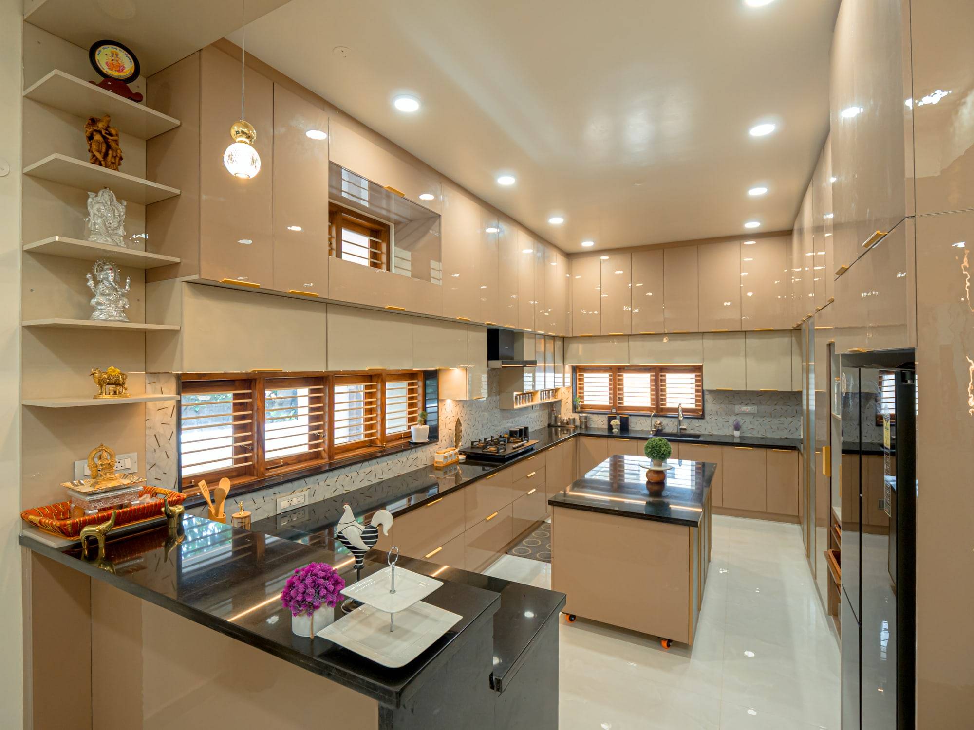 Champagne gloss modular kitchen with breakfast island