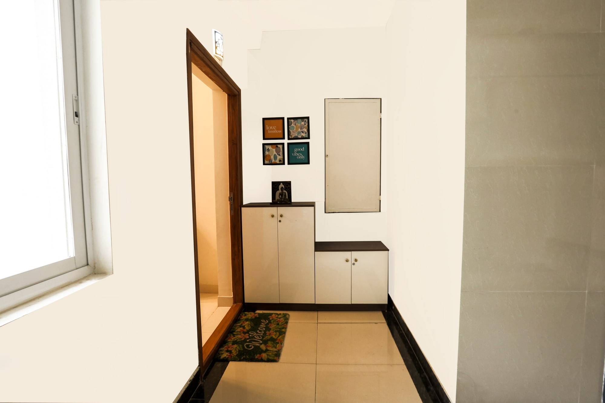 Entryway corridor with dual-tone shoe cabinet and low bench