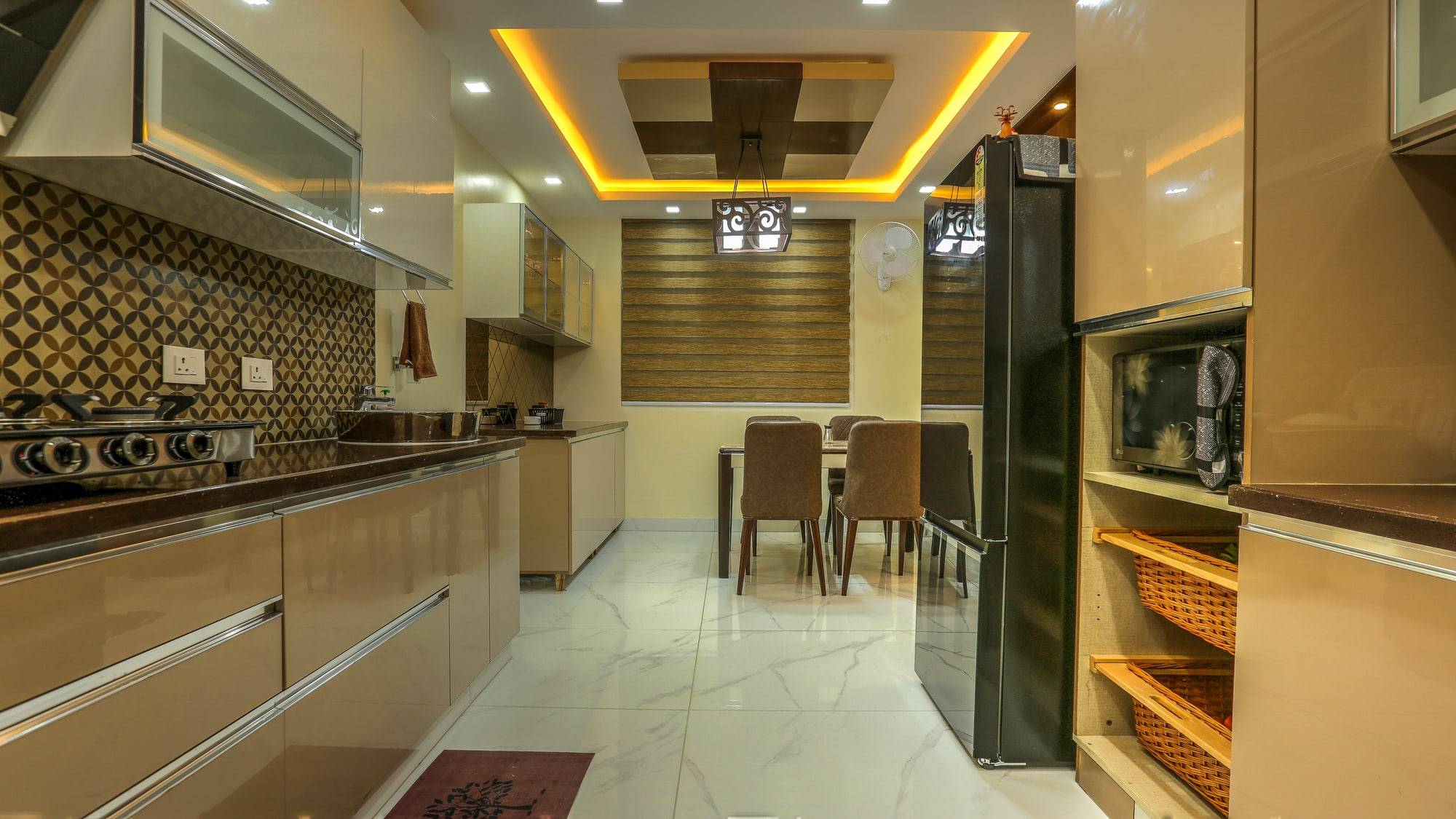 Modular kitchen looking towards dining space with pull-out wicker baskets