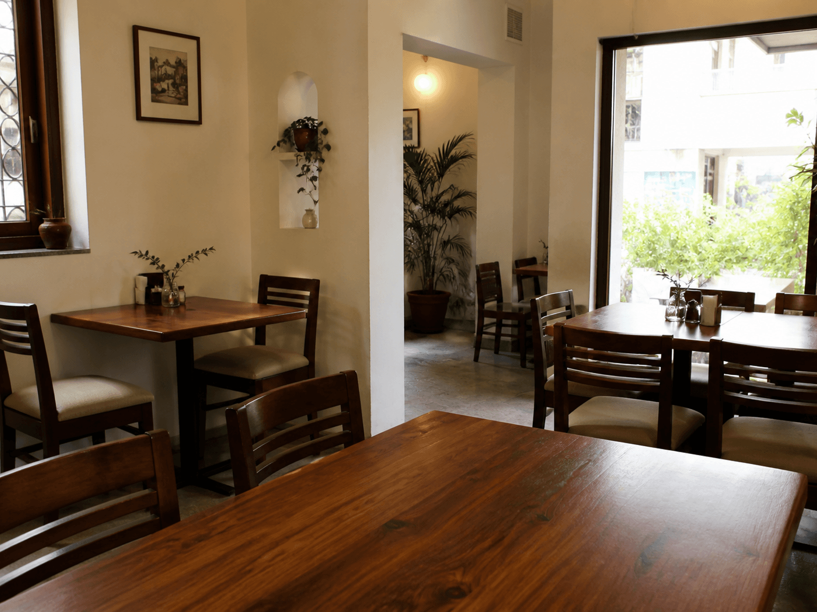 Café dining tables in warm wood