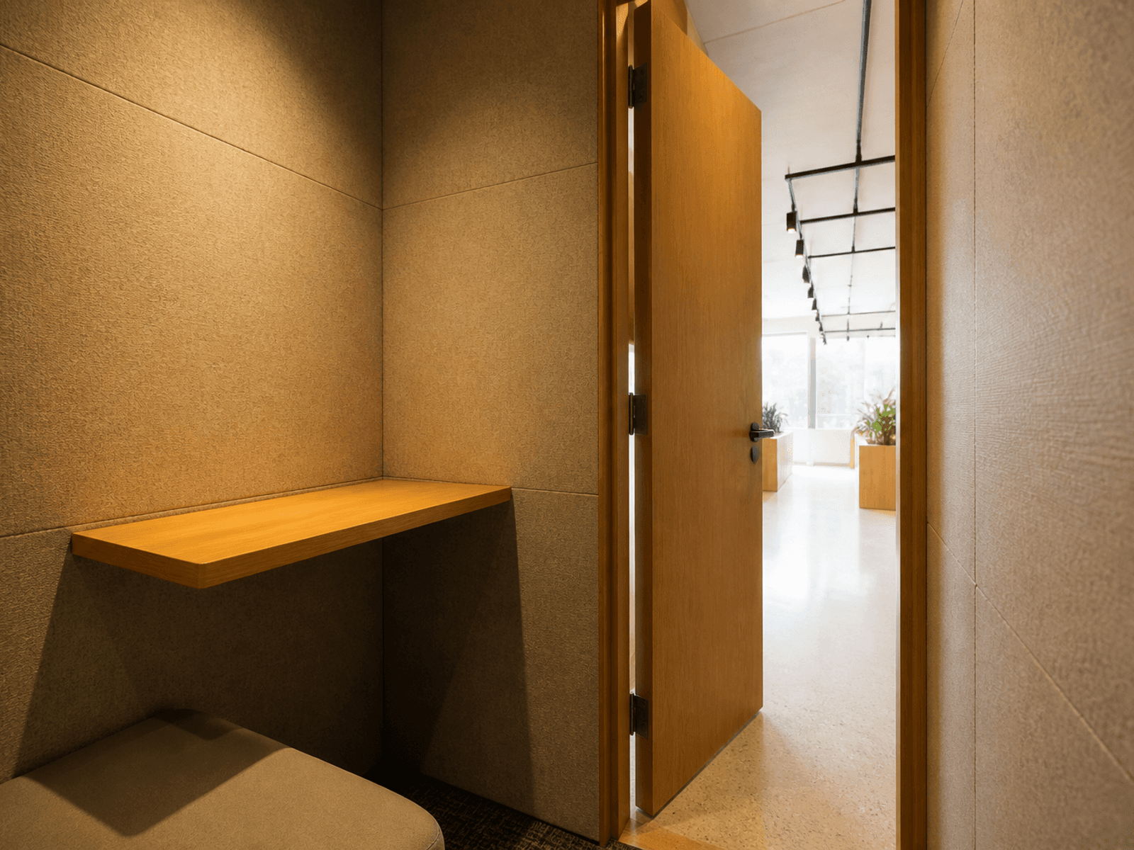 Acoustic fabric lining in a coworking booth