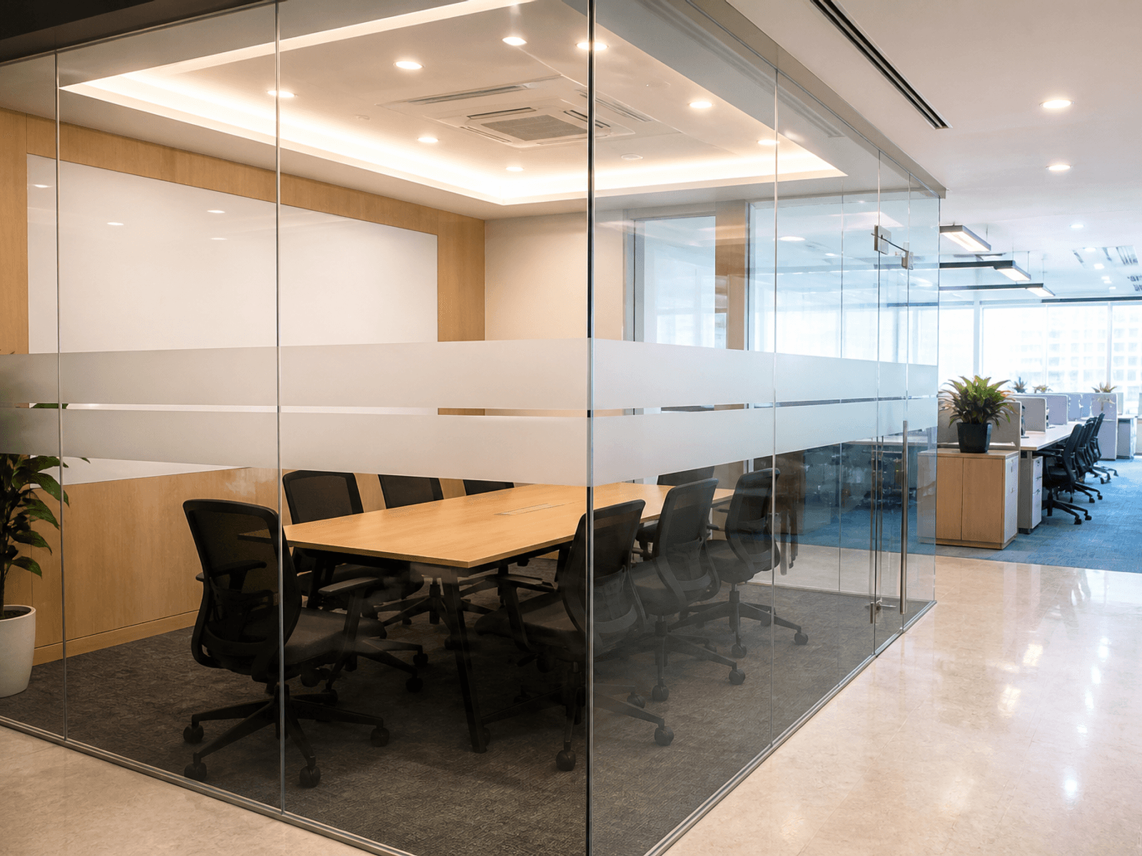 Glass meeting cabin in an office
